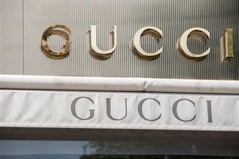 gucci public company|who is gucci owned by.